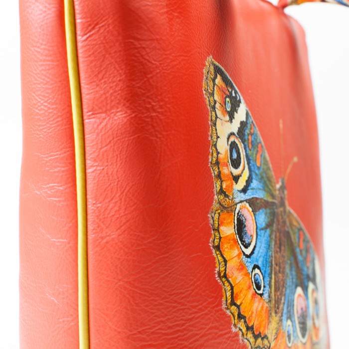 Borsa arancio con farfalla