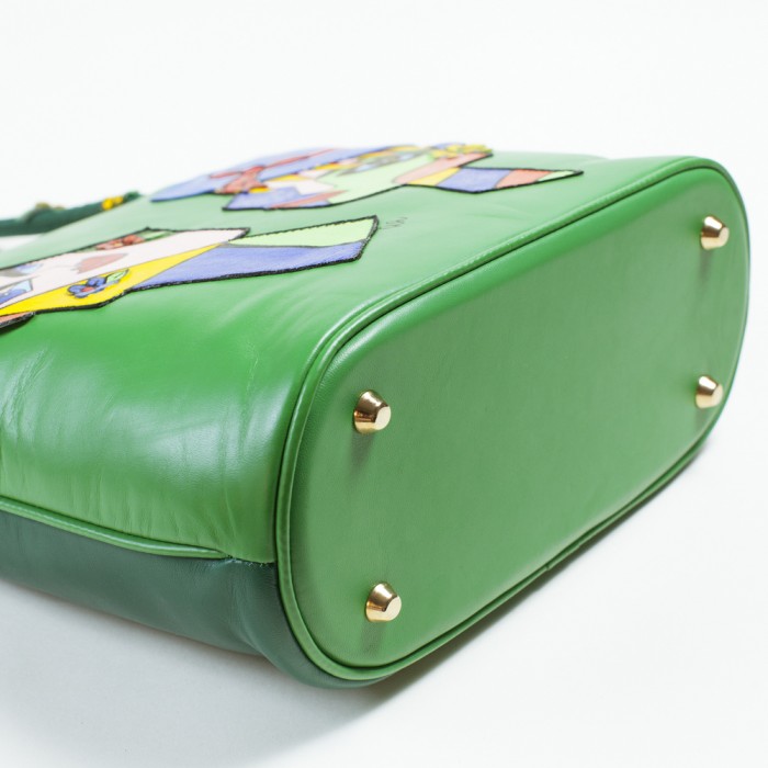 Borsa verde con coppia pop