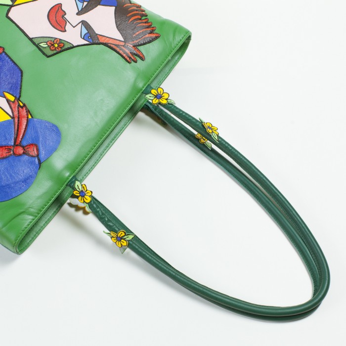 Borsa verde con coppia pop