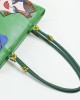 Borsa verde con coppia pop