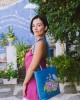 Borsa azzurra con fiori e farfalla 