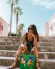Borsa verde con coppia pop