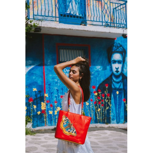 Borsa arancio con farfalla