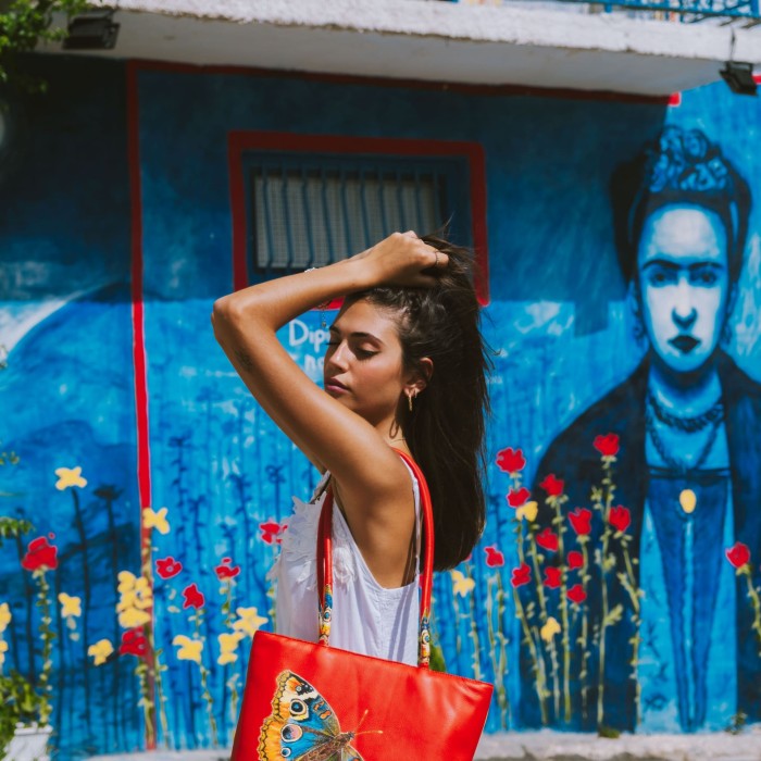 Borsa arancio con farfalla